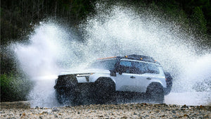 Dissent Built GX550 splash through a river crossing